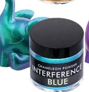 Jar of Chameleon Powder with 'Interference Blue' label on a colorful background