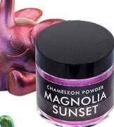 Jar of Chameleon Powder Magnolia Sunset with a blurred background