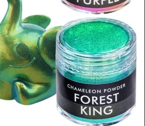 Green chameleon powder in a container labeled 'Forest King' with a colorful background.